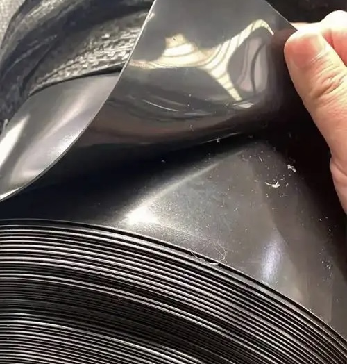 Close-up-of-black-HDPE-geomembrane-showing-smooth-waterproof-surface